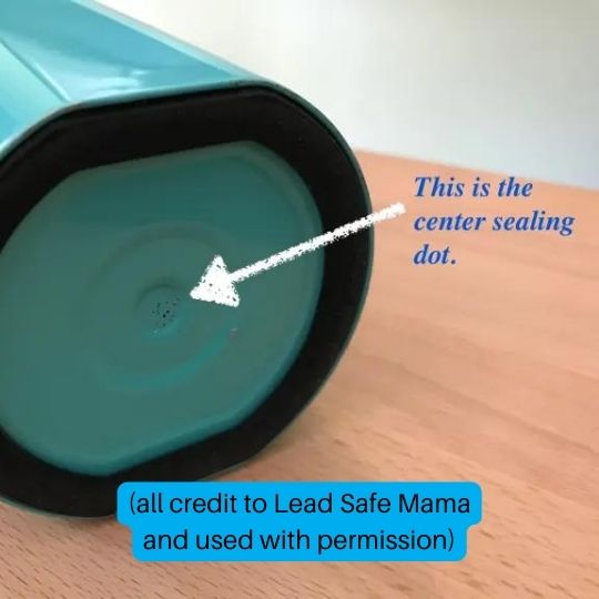 What the lead seal looks like in another similar bottle (under the paint)